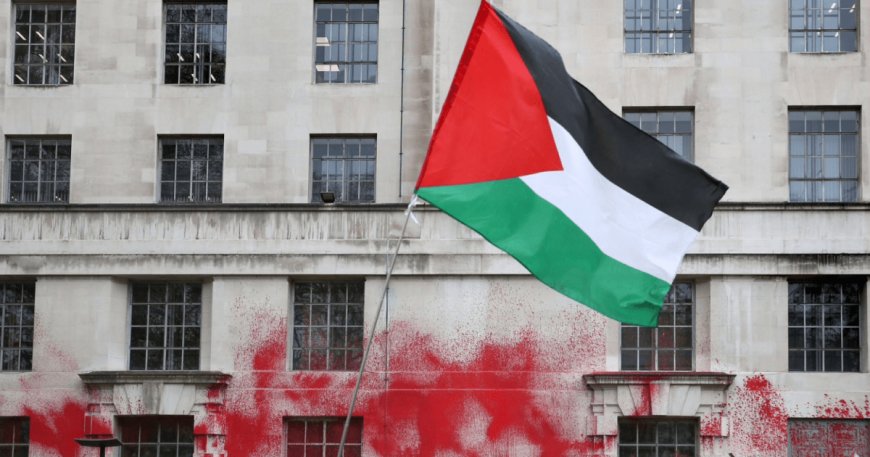 Activists spray paint UK’s Ministry of Defence building red