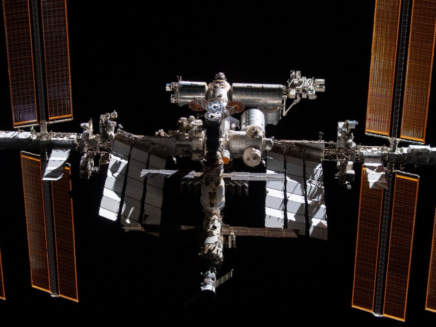 ISS astronauts take cover as defunct Russian satellite shatters