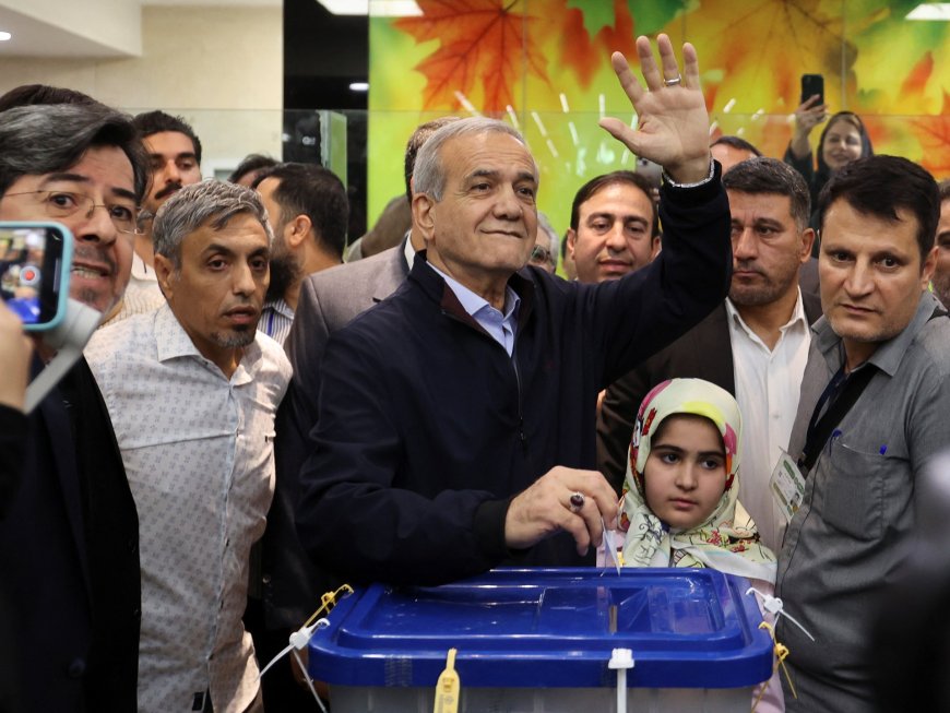 Iran poised for presidential run-off in tight race