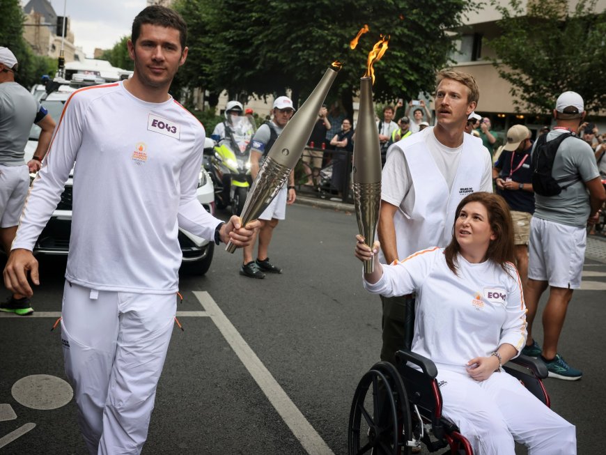 Lebanese journalist wounded in Israeli strike carries Olympic torch