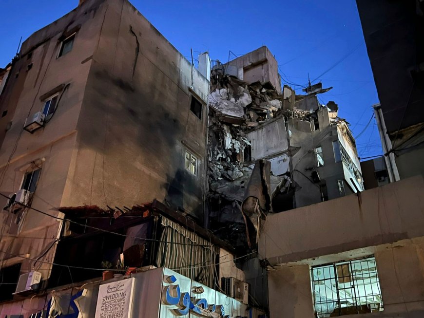 Photos: Israel strikes building in Beirut suburbs