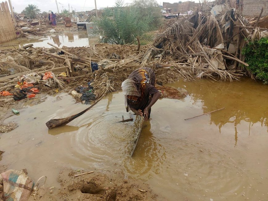 What has caused the cholera outbreak in Sudan?