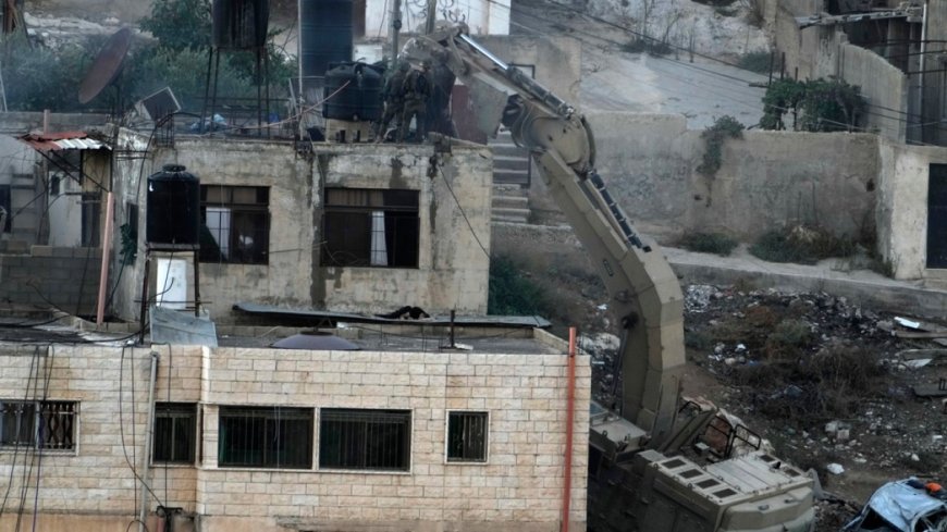 Israeli soldiers filmed pushing bodies off rooftop in deadly West Bank raid