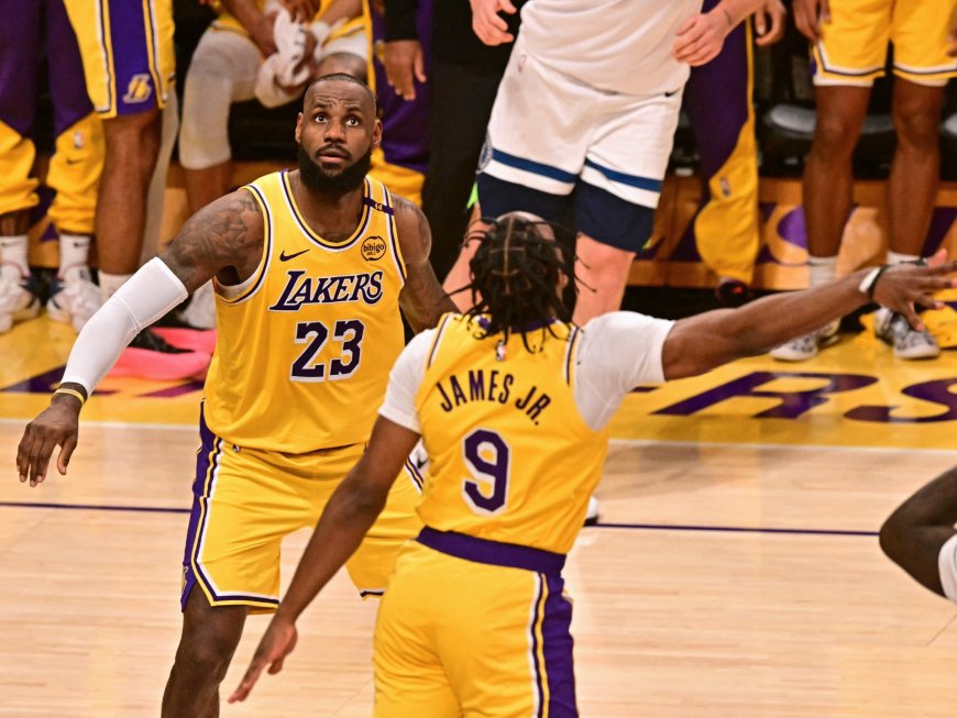 LeBron and Bronny James share court, make NBA history as Lakers beat Wolves