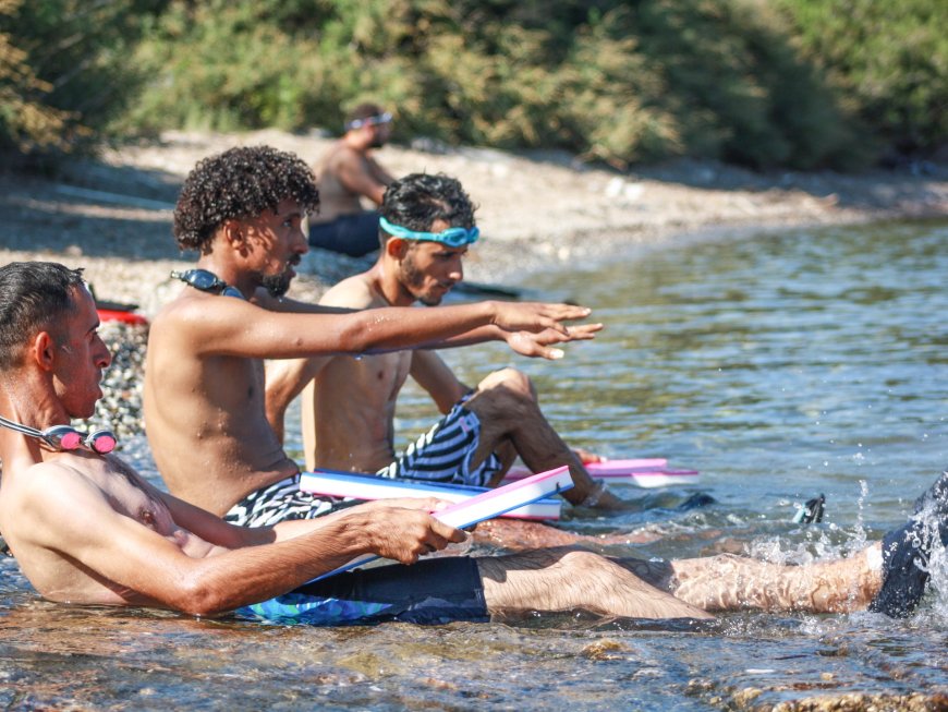 Facing the fear of water: Refugees learn to swim in Lesbos