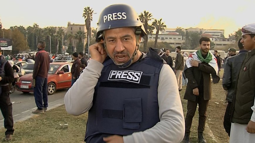 Al Jazeera reporter nearly drowned out by celebrations in Damascus