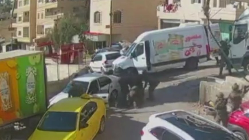 Israeli soldiers hide in white van to arrest Palestinian man